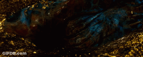 A Close Up Of A Person 'S Hand With A Dark Background GIF