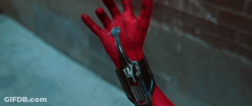 A Close Up Of A Person 'S Hand With A Device On It That Says ' Spiderman ' On It GIF