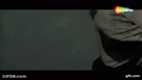 A Close Up Of A Person 'S Hand With A Watermark That Says ' Shemaroon ' On It GIF
