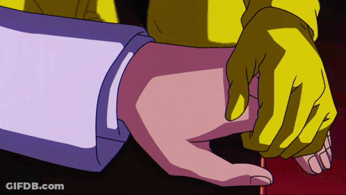 A Close Up Of A Person 'S Hand With A Yellow Glove On GIF