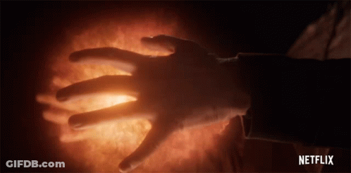 A Close Up Of A Person 'S Hand With Netflix Written On The Bottom Right GIF