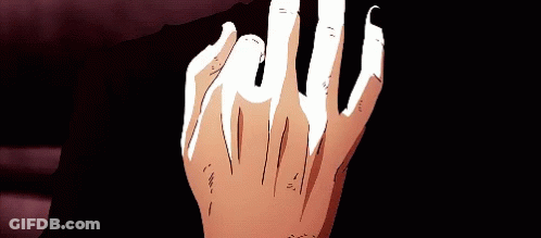 A Close Up Of A Person 'S Hand With Sharp Claws GIF
