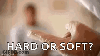 A Close Up Of A Person 'S Hand With The Words `` Hard Or Soft ? '' Written On It . GIF