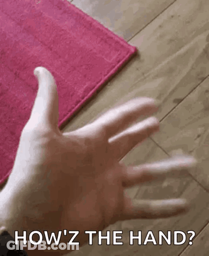 A Close Up Of A Person 'S Hand With The Words `` How 'Z The Hand ? '' Written On It . GIF