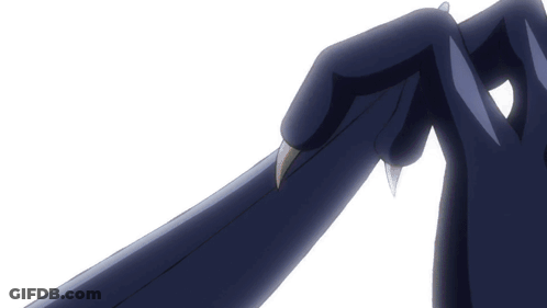 A Close Up Of A Person 'S Hands Holding A Sword GIF