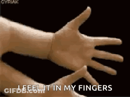 A Close Up Of A Person 'S Hands With The Words I Feel It In My Fingers GIF