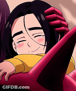 A Close Up Of A Person 'S Head With A Hand On It GIF