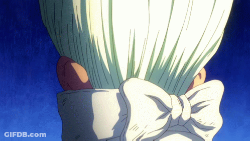 A Close Up Of A Person 'S Head With A White Bow GIF