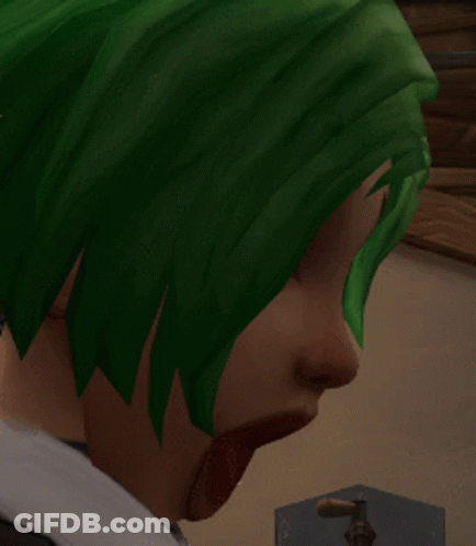 A Close Up Of A Person 'S Head With Green Hair GIF