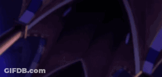 A Close Up Of A Person 'S Head With Their Hands . GIF