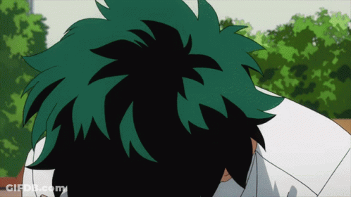 A Close Up Of A Person 'S Head With Trees In The Background GIF