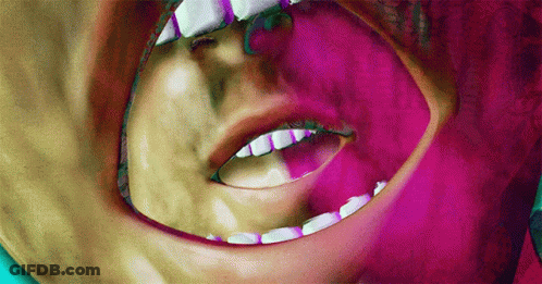 A Close Up Of A Person 'S Mouth And Teeth GIF
