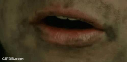 A Close Up Of A Person 'S Mouth And The Words Share The Load GIF