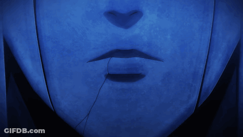 A Close Up Of A Person 'S Mouth With A Blue Background GIF