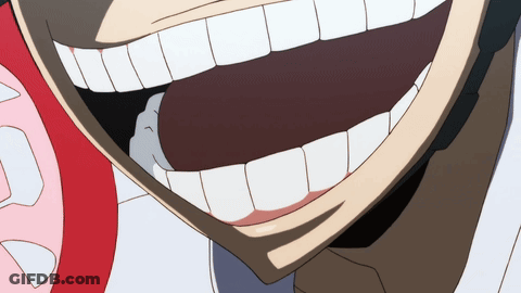 A Close Up Of A Person 'S Mouth With A Large Smile On It GIF