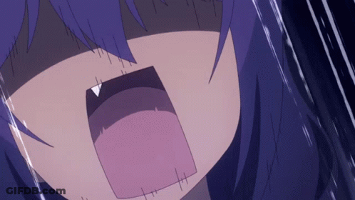A Close Up Of A Person 'S Mouth With A Purple Tongue Sticking Out GIF