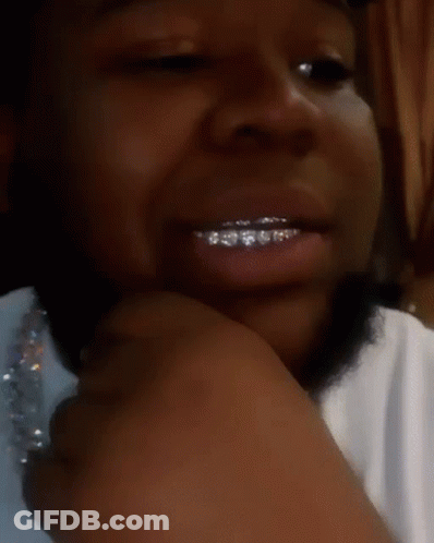A Close Up Of A Person 'S Mouth With Braces On Their Teeth GIF