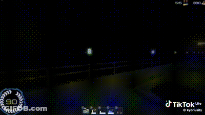 A Close Up Of A Person 'S Mouth With Circles Coming Out Of It GIF