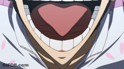 A Close Up Of A Person 'S Mouth With Their Tongue Out GIF