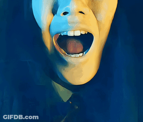 A Close Up Of A Person 'S Mouth With Their Tongue Out GIF