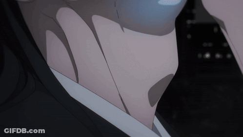 A Close Up Of A Person 'S Neck With A Black Background GIF