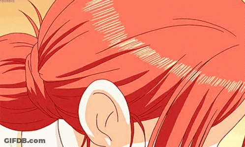 Close Up Of Person's Red Hair And Ear GIF