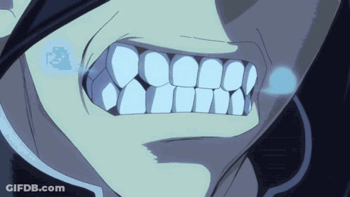 A Close Up Of A Person 'S Teeth With A Blue Light Coming Out Of It GIF