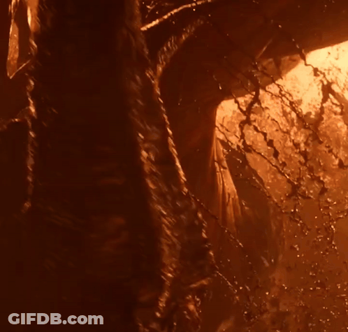 A Close Up Of A Person 'S Torso With Glowing Eyes GIF