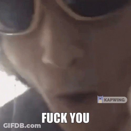 A Close Up Of A Person Screaming With The Words " Fuck You " On The Bottom GIF