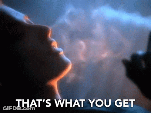 A Close Up Of A Person Smoking A Cigarette With The Words `` That 'S What You Get '' Written Below It . GIF