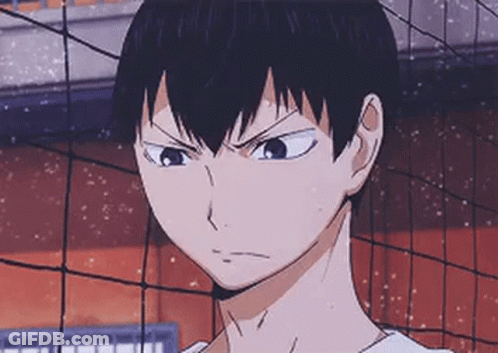 A Close Up Of A Person Standing In Front Of A Volleyball Net With A Serious Look On Their Face . GIF
