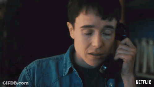 A Close Up Of A Person Talking On A Telephone With Netflix Written On The Bottom GIF