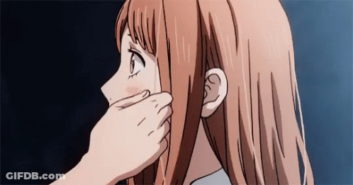 A Close Up Of A Person Touching A Girl 'S Face With Their Hand . GIF