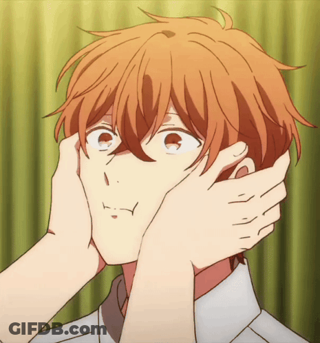 A Close Up Of A Person Touching Another Person 'S Face With Their Hands GIF