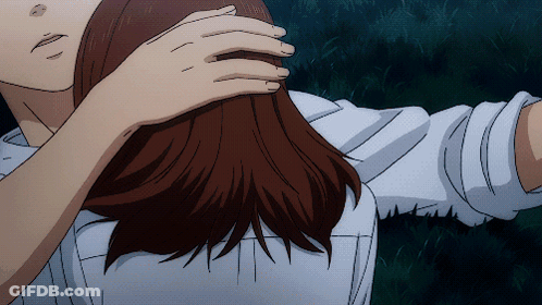 A Close Up Of A Person Touching Another Person 'S Neck GIF
