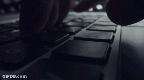 A Close Up Of A Person Typing On A Keyboard With The H Key GIF