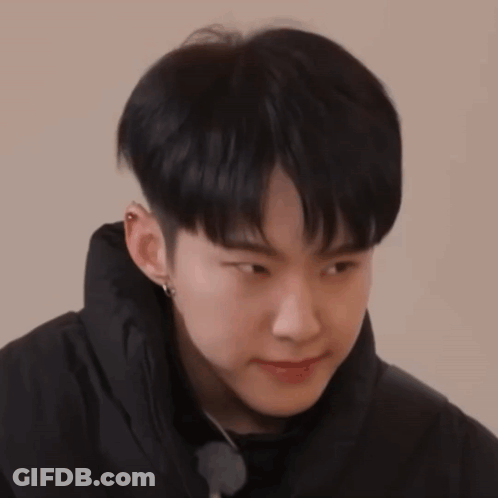 A Close Up Of A Person Wearing A Black Jacket GIF