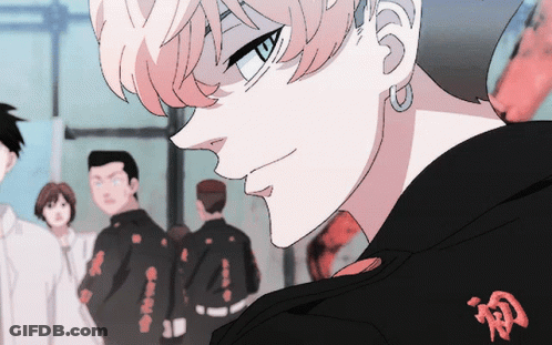 A Close Up Of A Person Wearing A Black Jacket With Chinese Characters On The Back GIF