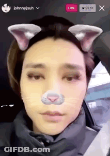 A Close Up Of A Person Wearing A Cat Ear Headband . GIF