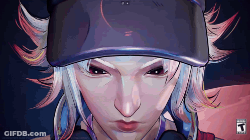 A Close Up Of A Person Wearing A Hat With A T On The Bottom Right GIF