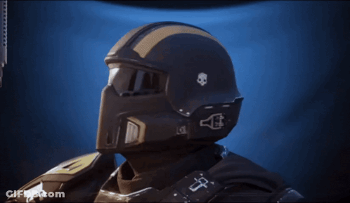 A Close Up Of A Person Wearing A Helmet And Goggles With A Cross On His Chest GIF