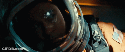 A Close Up Of A Person Wearing A Helmet That Says ' Nasa ' On It GIF