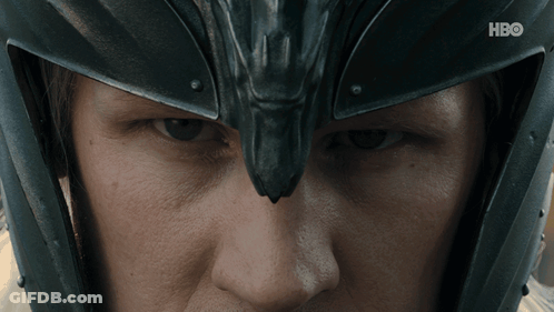 A Close Up Of A Person Wearing A Helmet With Hbo Written On The Bottom GIF
