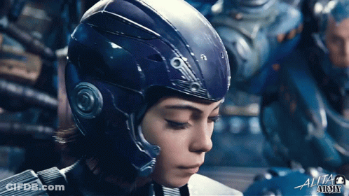 A Close Up Of A Person Wearing A Helmet With The Word Alita At The Bottom Right GIF