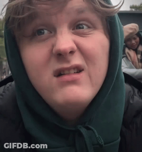 A Close Up Of A Person Wearing A Hooded Jacket GIF