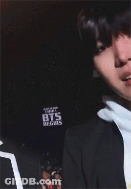 A Close Up Of A Person Wearing A Hoodie That Says Sde GIF