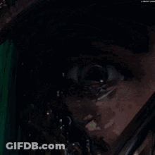 A Close Up Of A Person Wearing A Mask And Goggles GIF