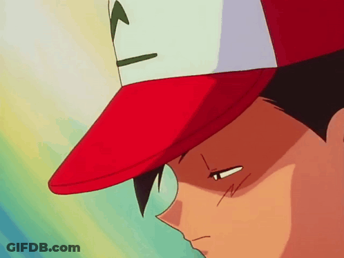 A Close Up Of A Person Wearing A Red Hat With A Pokemon On It GIF