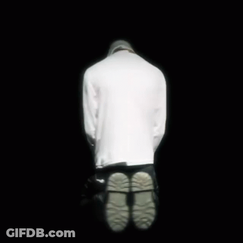 A Close Up Of A Person Wearing A Shirt That Says Killer On It . GIF