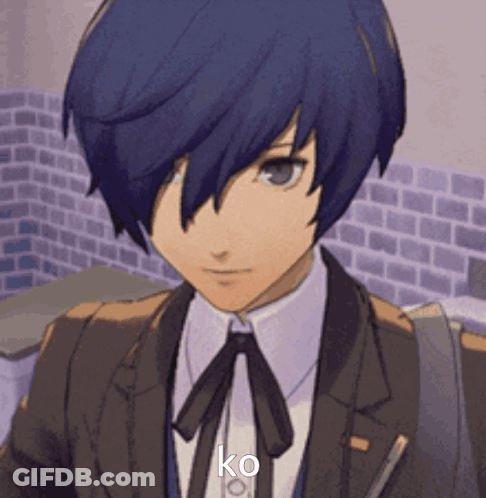 A Close Up Of A Person Wearing A Suit And Tie With The Word Ko On It . GIF